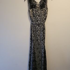 Black lace overlay dress with beaded belt